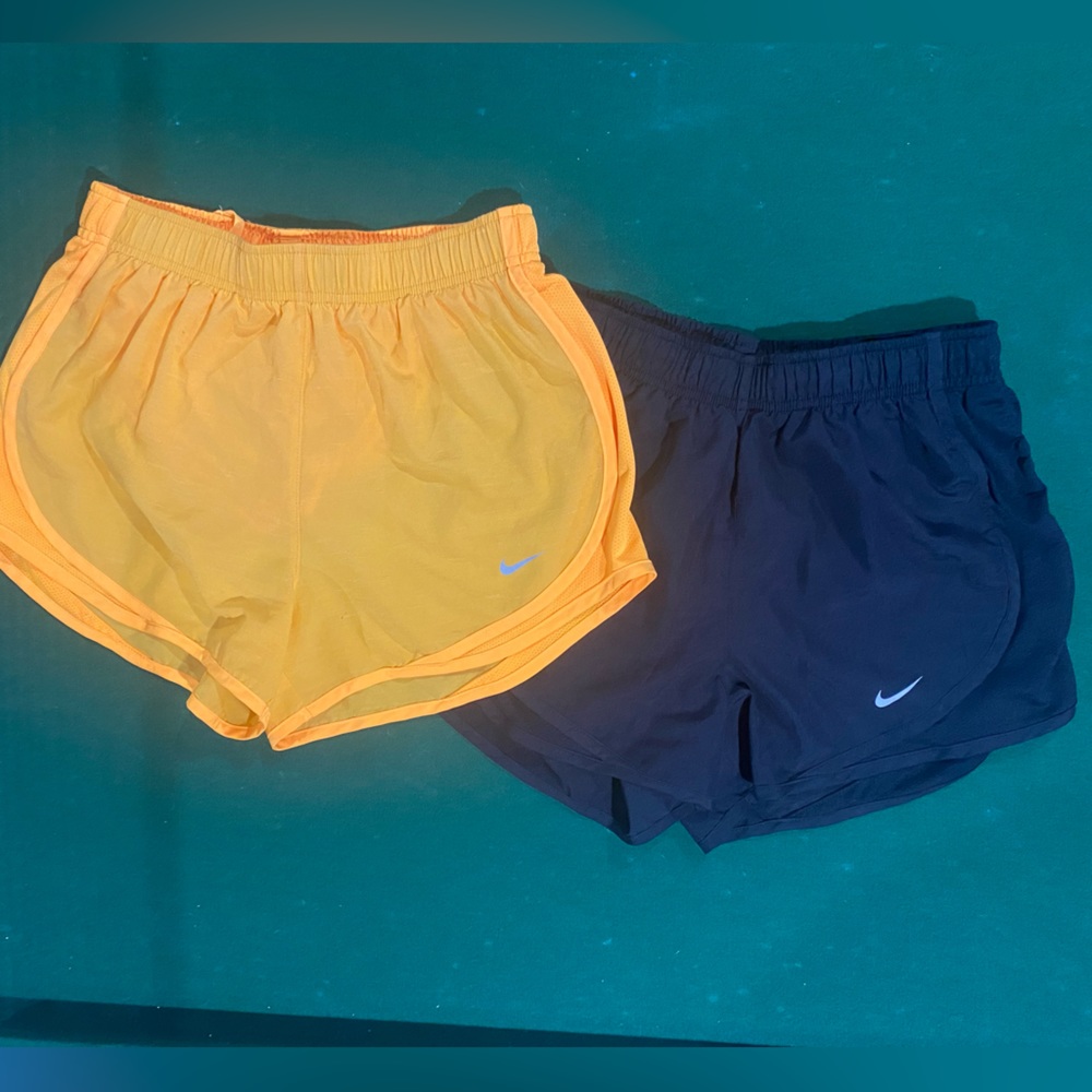 2 Pairs of Women Nike Tempo Shorts